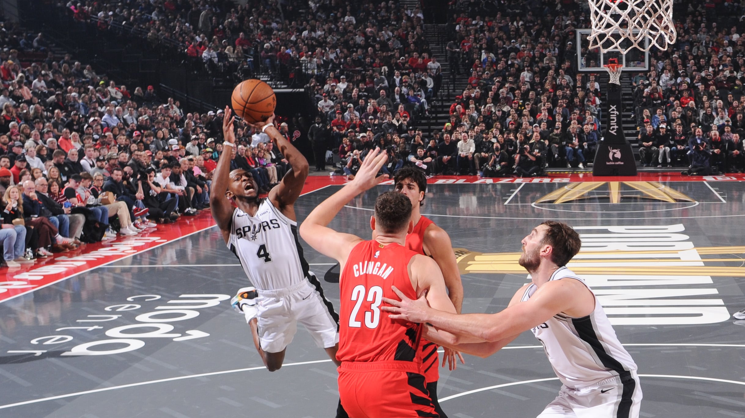 Fox keeps Spurs alive in Cup play; Blazers eliminated