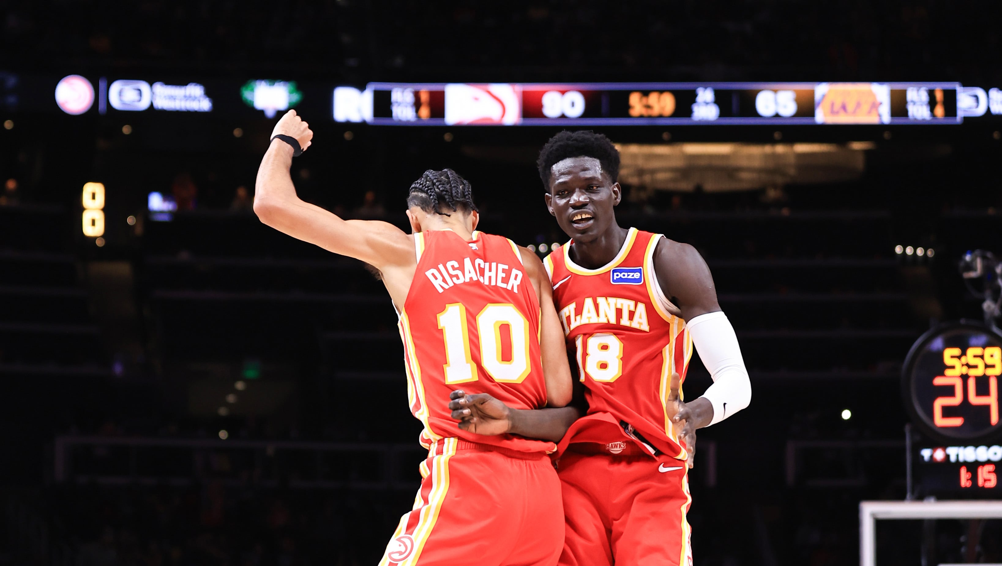 Hawks use balanced attack to snap Lakers' win streak