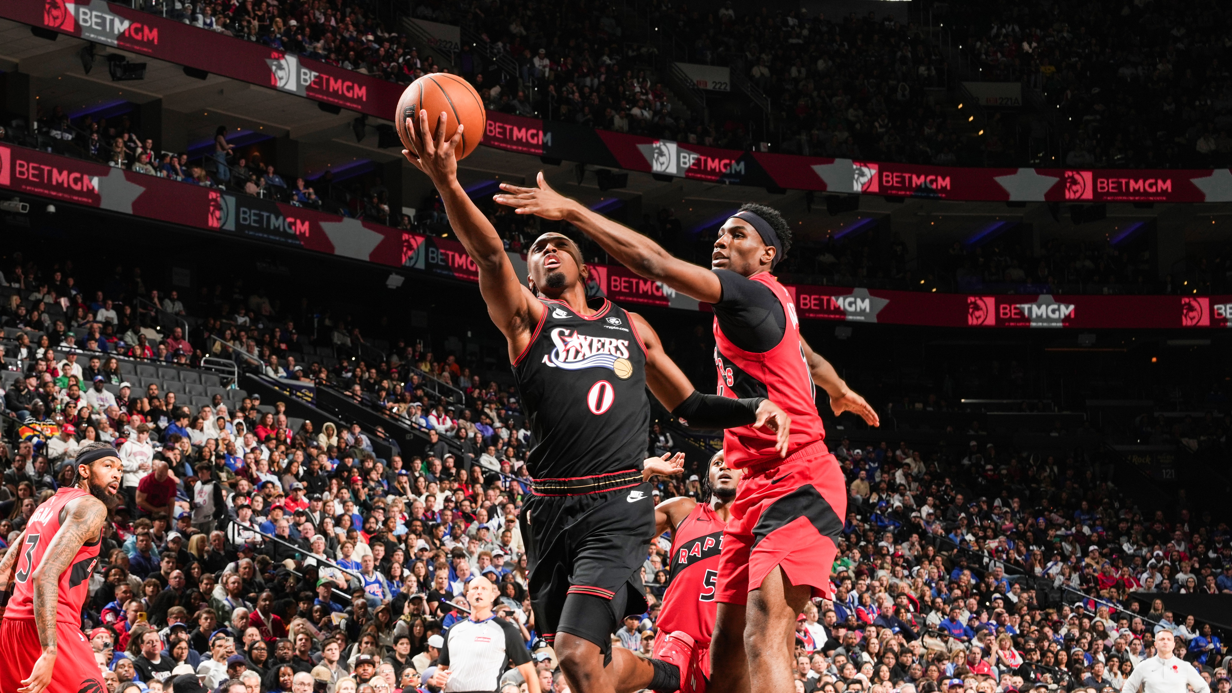 Maxey, Embiid combine for 60 to help 76ers cool Raptors