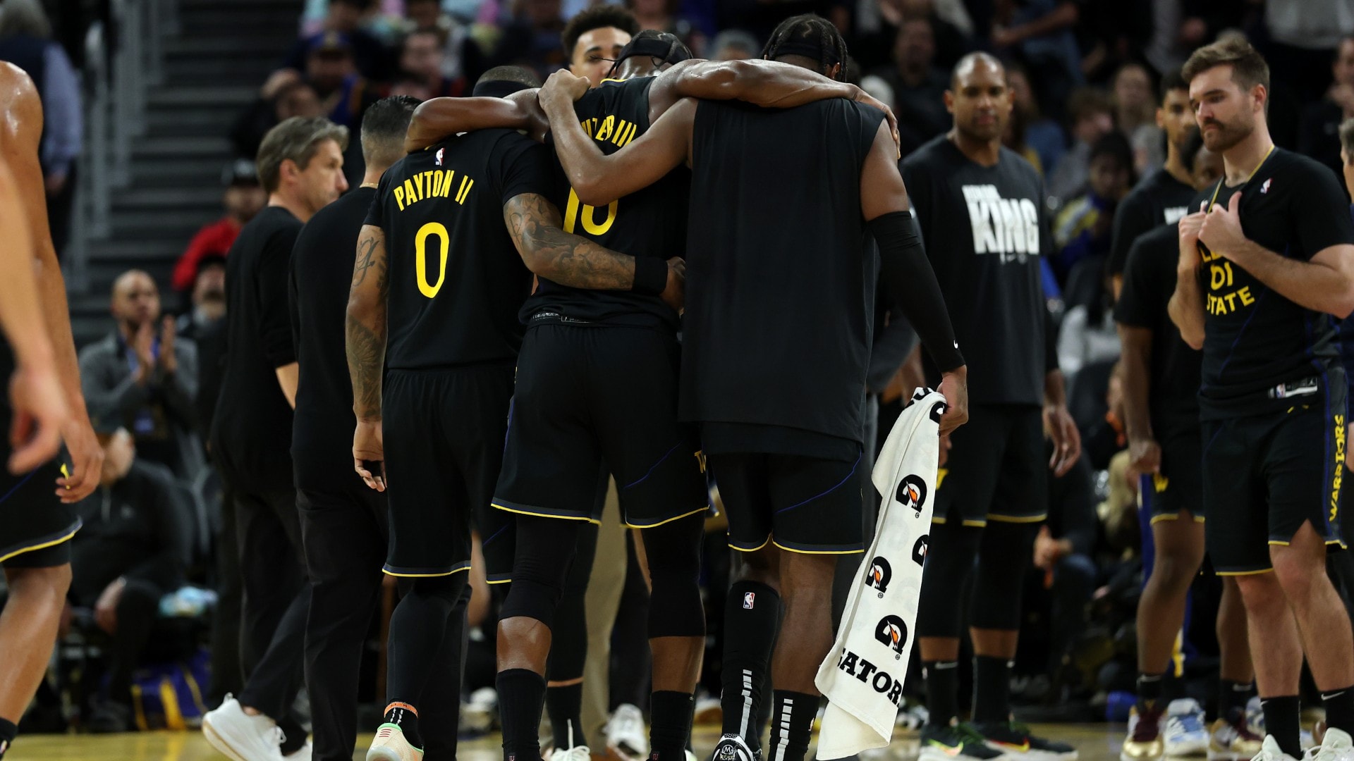 Balanced Warriors beat Heat, lose Butler to injury