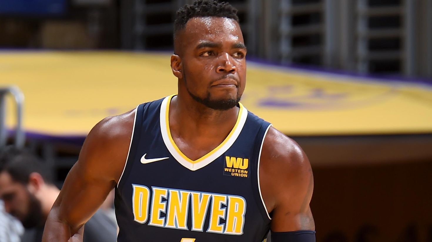 Paul Millsap exits game vs. Lakers with knee injury
