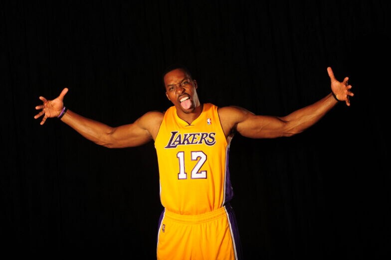 Dwight Howard in a Laker road jersey and black arm sleeves.JPG