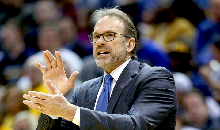 Los Angeles Lakers Kurt Rambis primps for the television camera