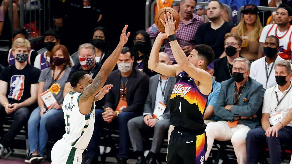 Booker knocks down deep 3