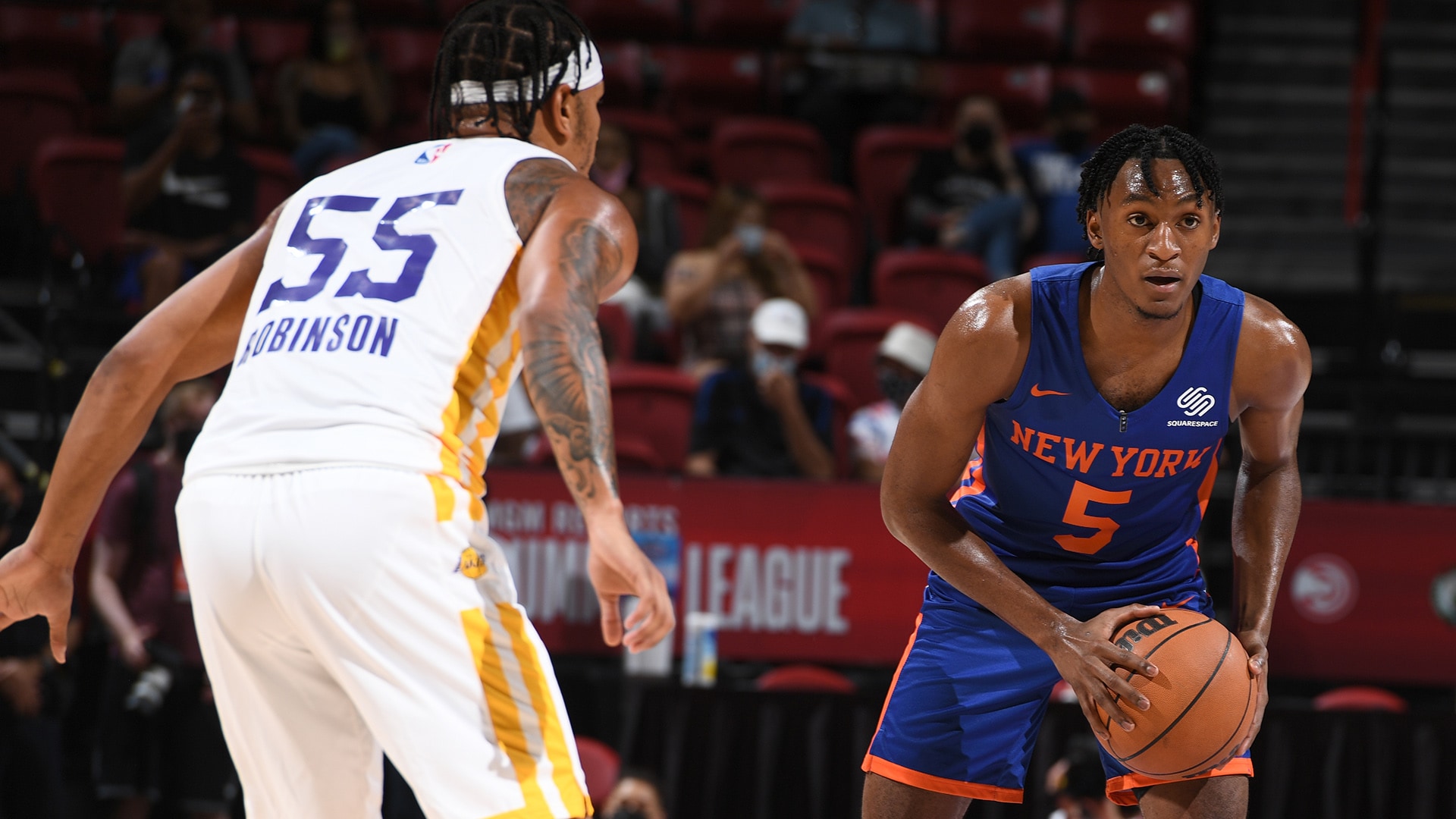 Immanuel Quickley taking a shot during the Summer League game against the Lakers, highlighting his impressive stats