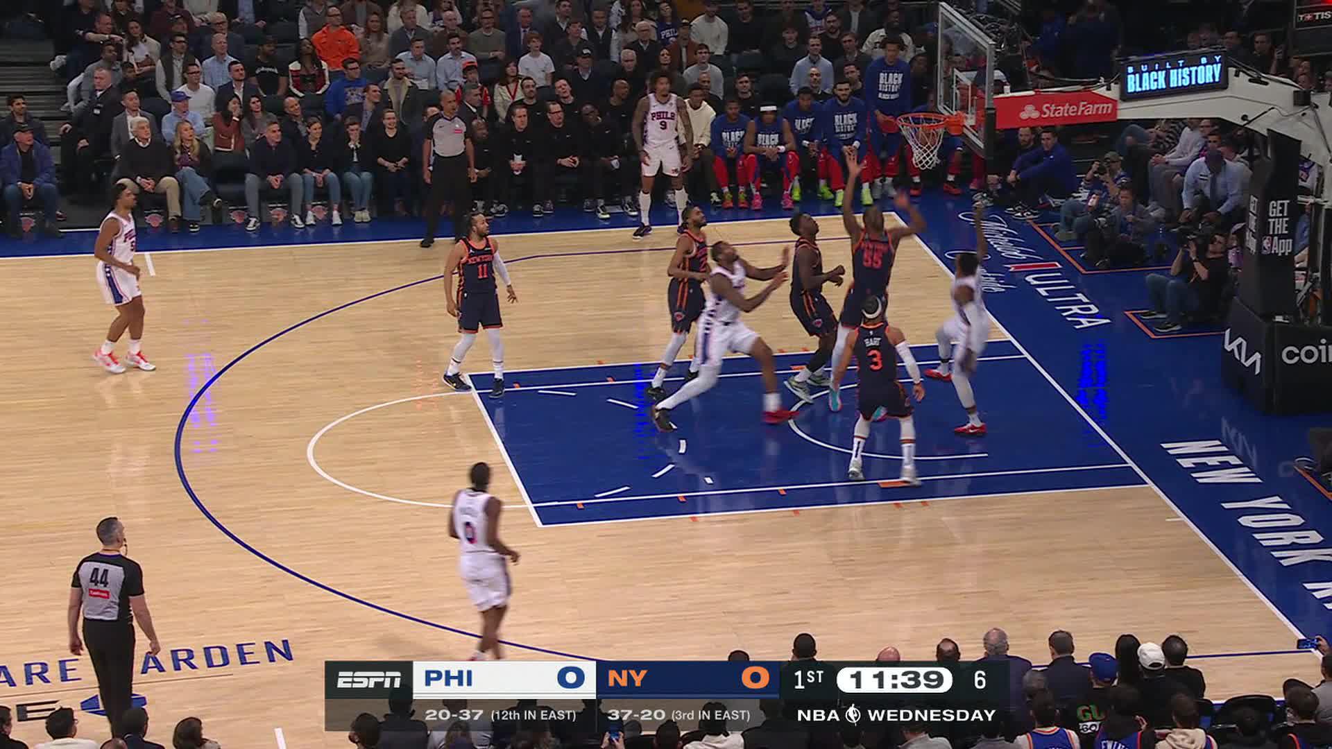 Paul George drives inside for the tough finish