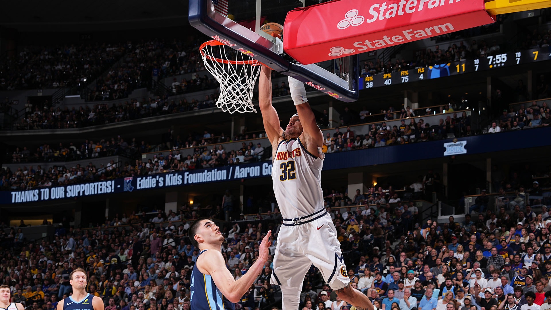 Nuggets rally to drop Grizz, get closer to playoff berth