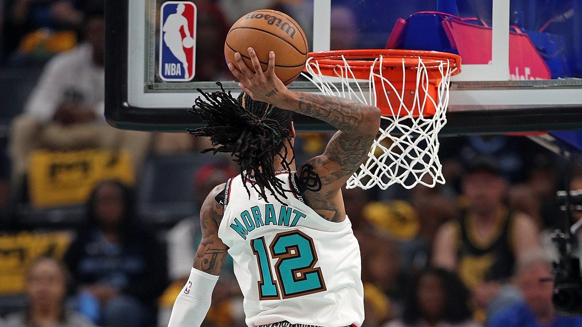 Ja Morant ascends for the slam!
