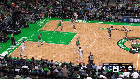Mikal Bridges drive past Jrue Holiday