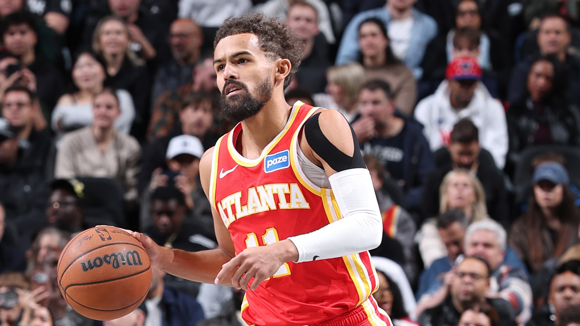 Hawks' Trae Young suffers sprained right knee vs. Nets