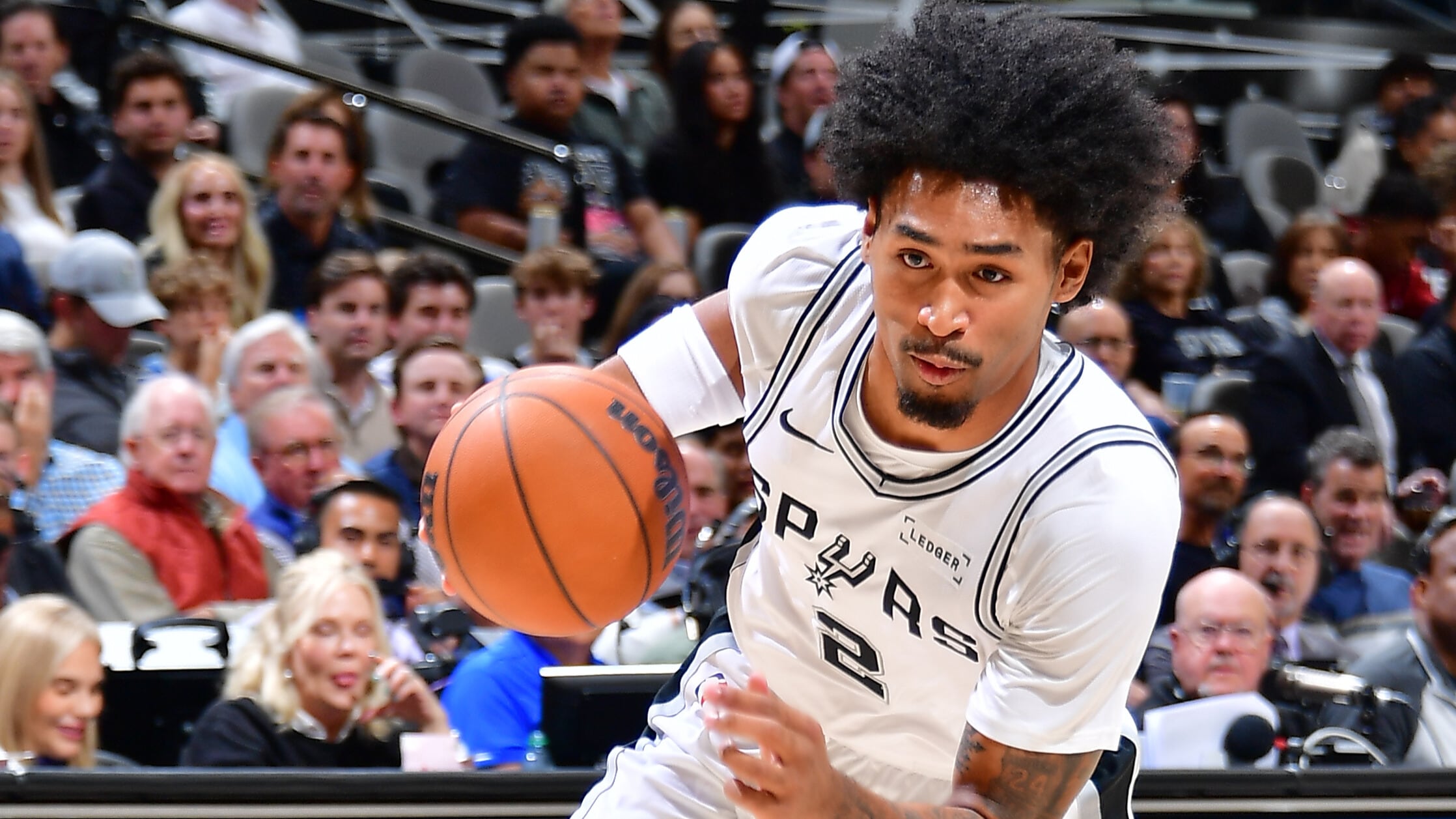 Spurs rookie Dylan Harper leaves game vs. Suns with left calf injury