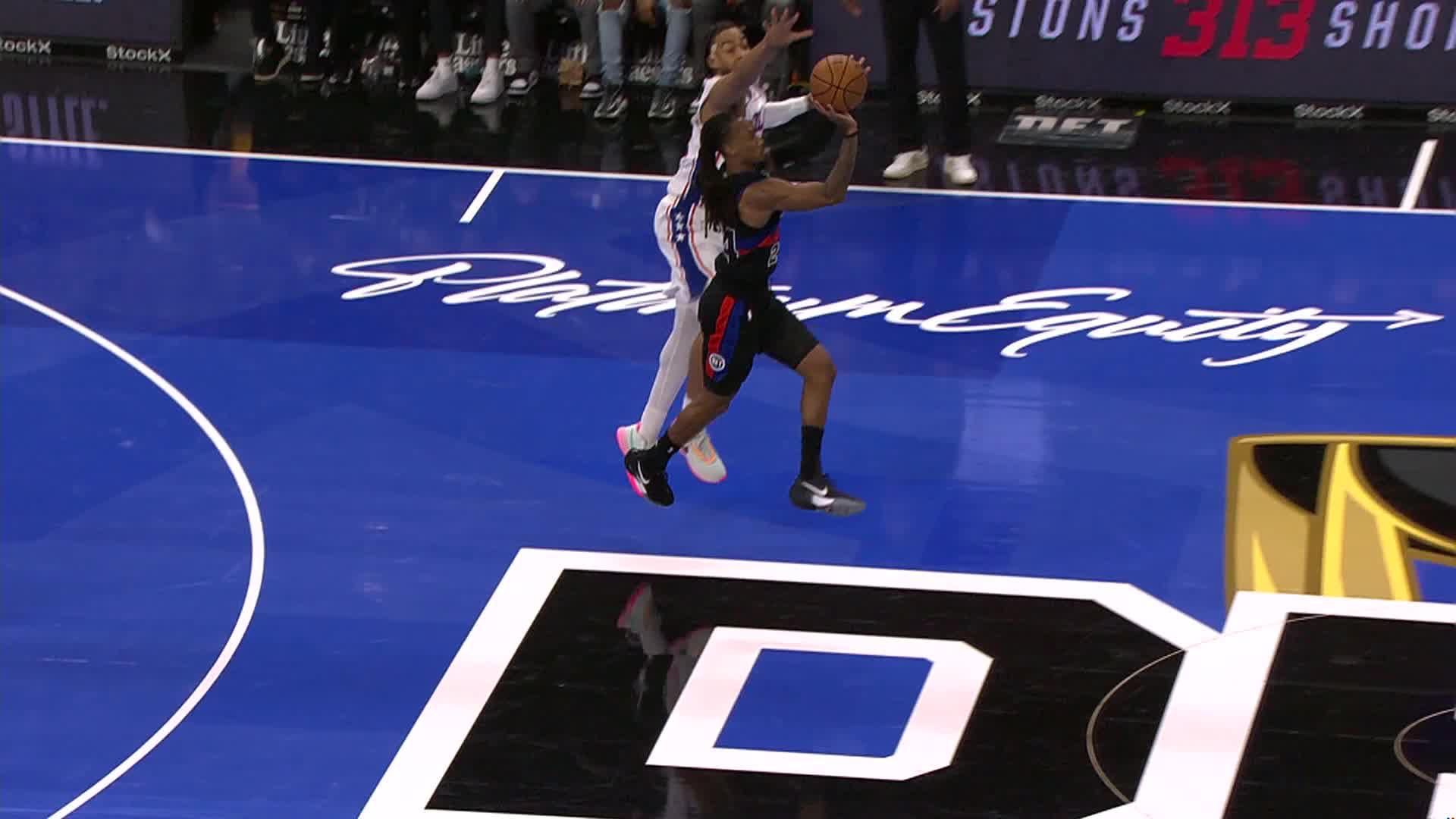 Daniss Jenkins gets the halfcourt heave to go!