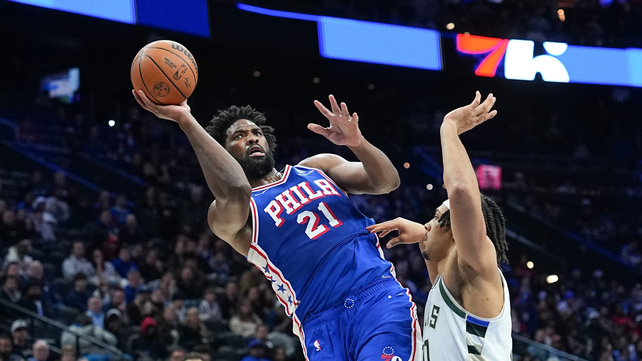 Embiid, George combine for 61 in wire-to-wire victory