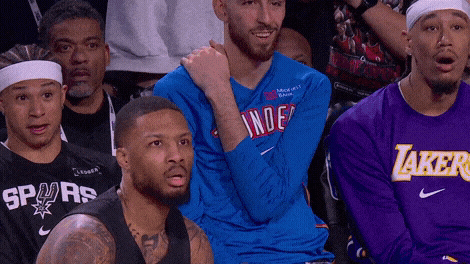 Carter Bryant and Jaxson Hayes react in awe to Damian Lillard's performance.