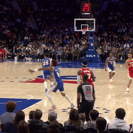 Jalen Johnson streaks downcourt for the fast break jam against the 76ers.