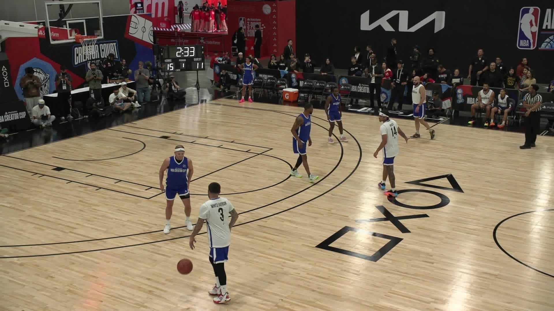 White Iverson maneuvers his way inside