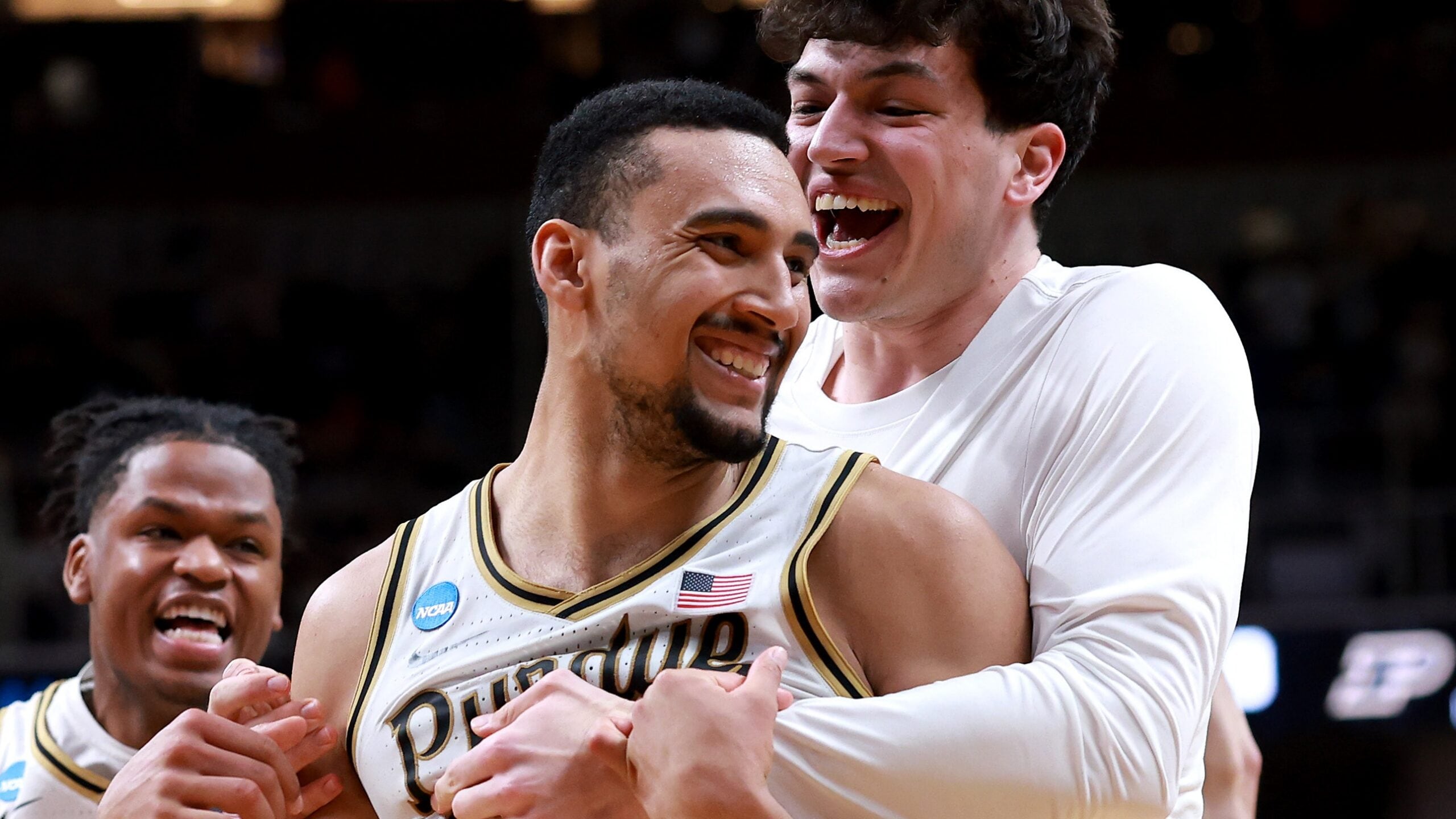 Sweet 16 Thrillers: Purdue & Iowa Punch Elite Eight Tickets!