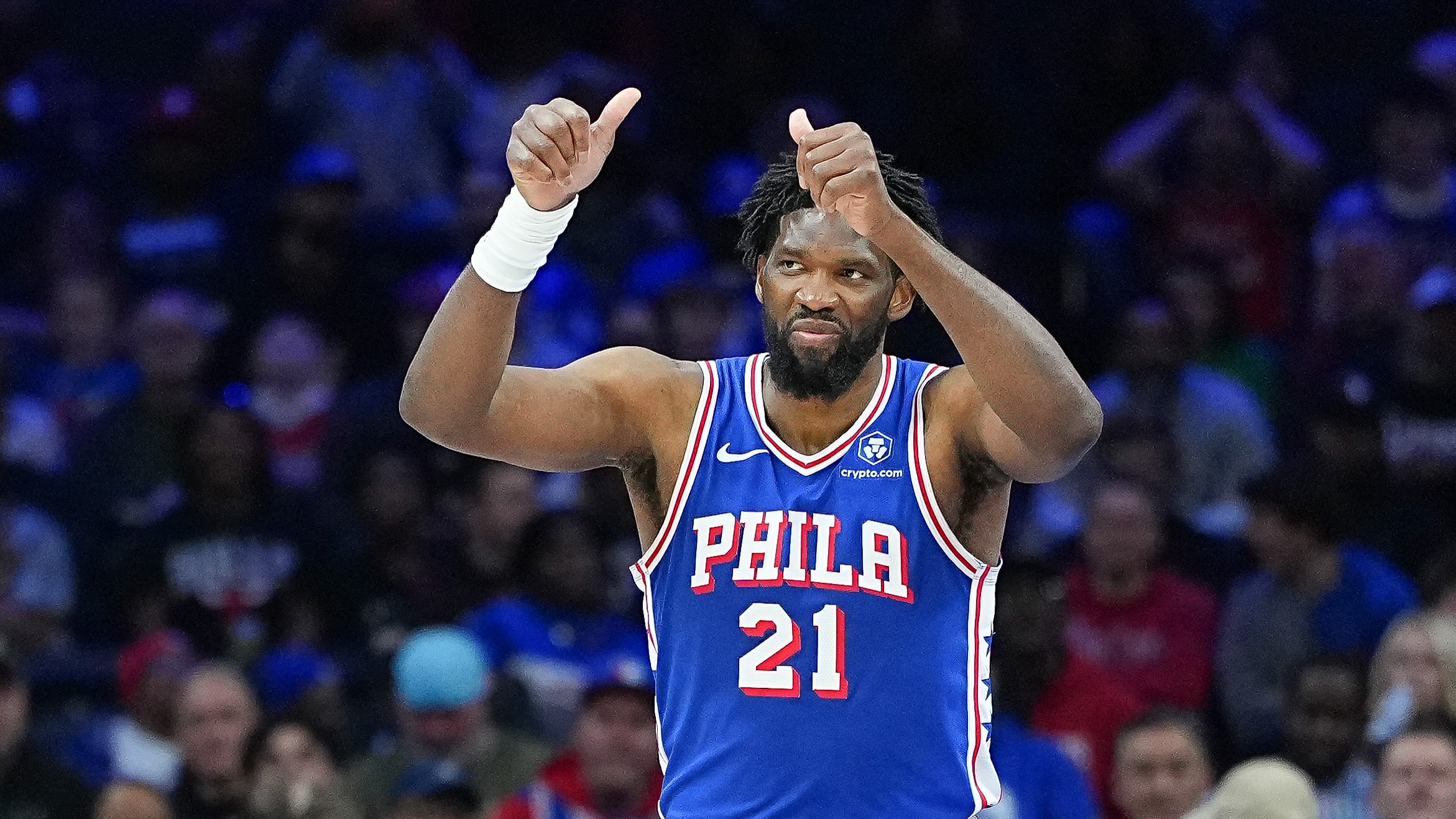 Embiid, George combine for 63 in triumphant return