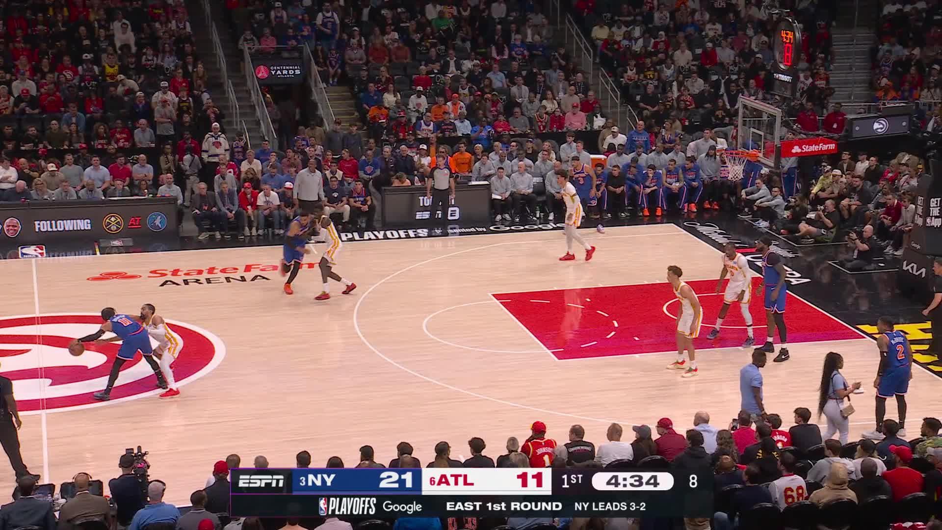 Jalen Brunson scoops home the basket off the glass