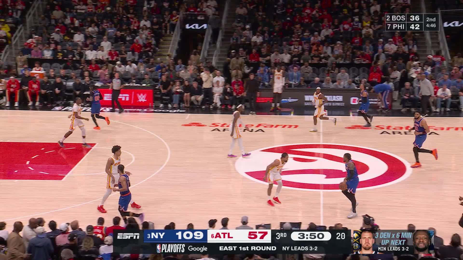 Karl-Anthony Towns dishes to Josh Hart for a triple-double