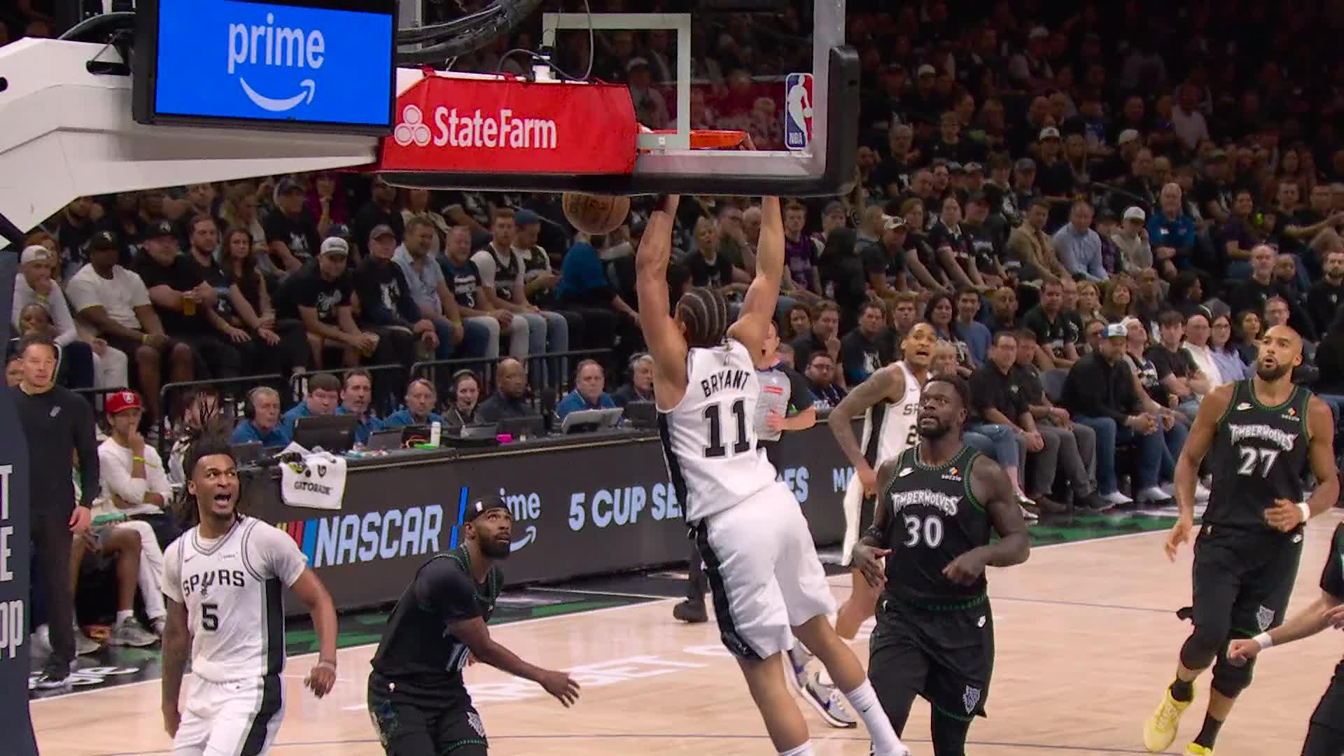 Carter Bryant rises to finish the alley-oop