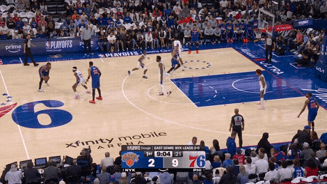 Karl-Anthony Towns drive past Joel Embiid