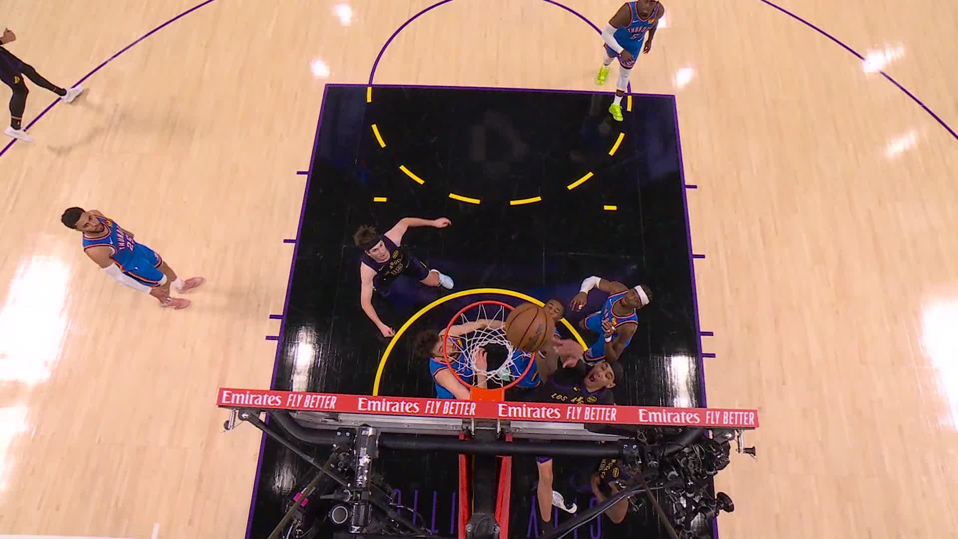 Jaxson Hayes tips the ball in to clean up the glass