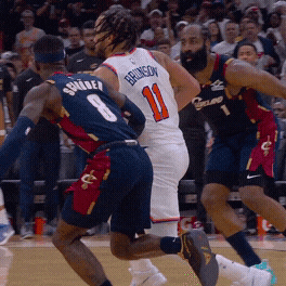 Jalen Brunson drives through the lane and finds Mitchell Robinson for the alley-oop.