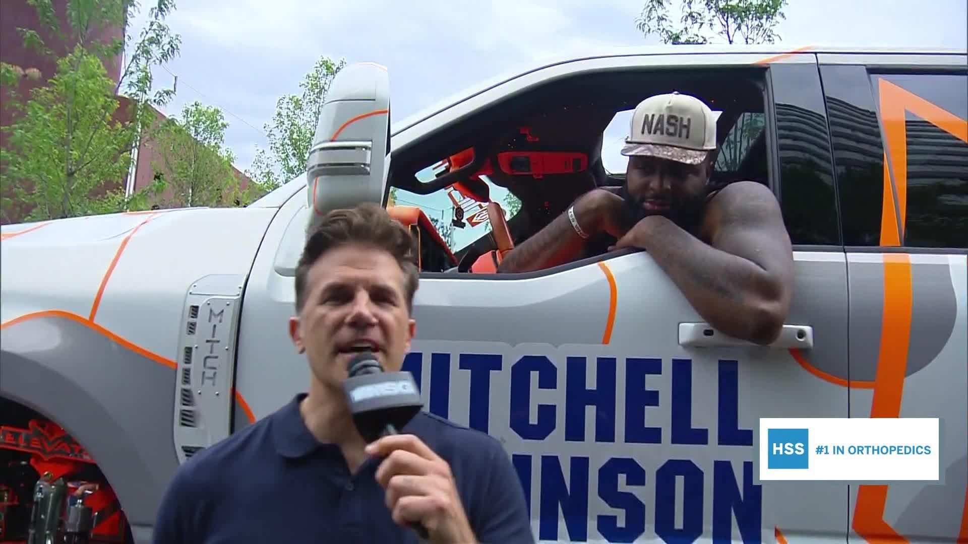 Mitchell Robinson rides into the championship parade in style