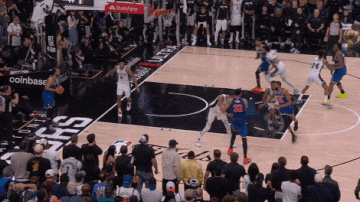 Off an out-of-bounds play, Mikal Bridges cuts to the corner, then finds the inbounder, Jalen Brunson, with a bounce pass along the baseline for a layup.