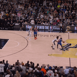 The Spurs bring Victor Wembanyama up above the arc to pressure Jalen Brunson, opening up a bounce pass to Karl-Anthony Towns in the pick-and-roll, who then swings the ball to Josh Hart, who finds Landry Shamet open in the corner for a 3-pointer.