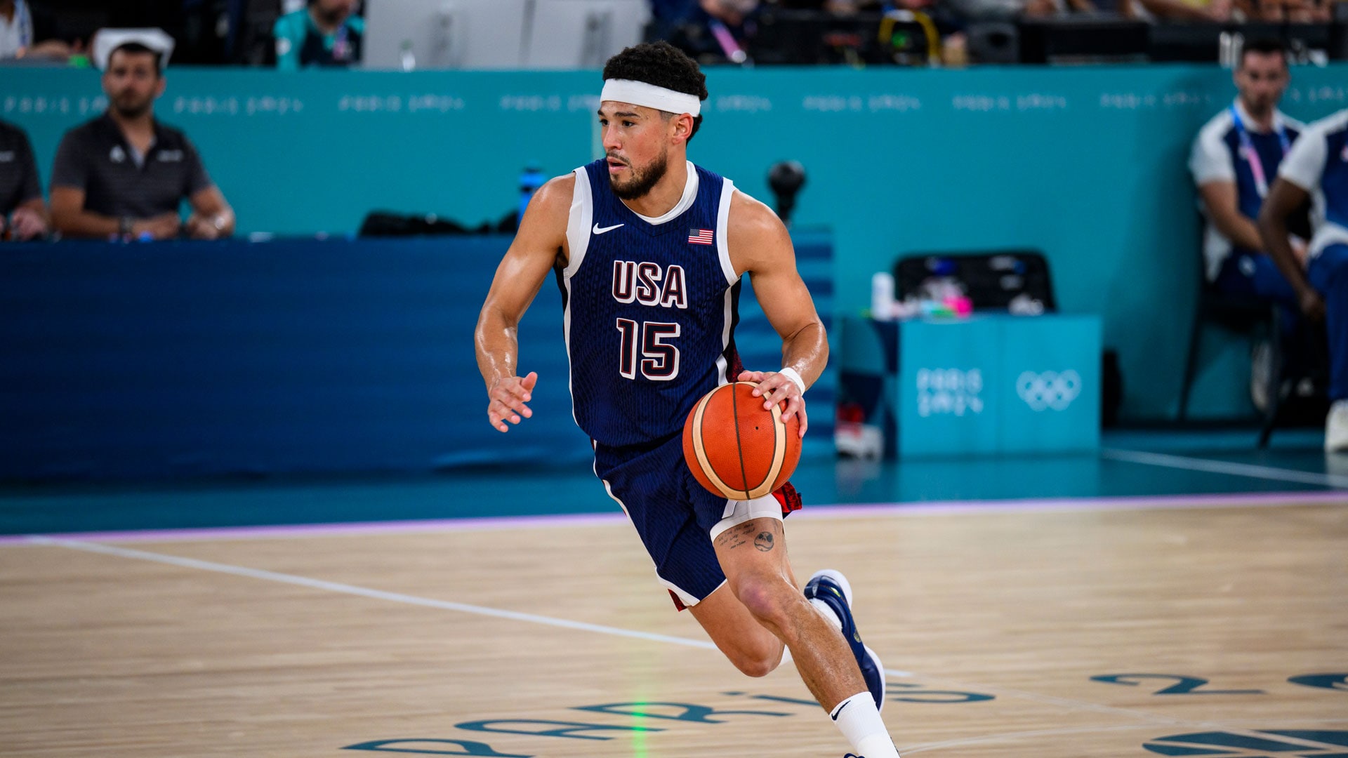 Suns’ All-Star guard Devin Booker changes jersey number to No. 15 in honor of his dad Melvin