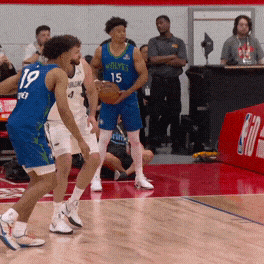 Joan Beringer throws down the alley-oop off the in-bounds pass.