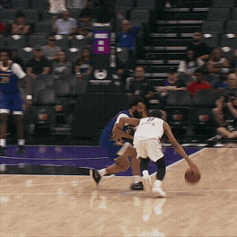 Mikel Brown Jr. spins into the lane, then dishes a right-handed wraparound pass behind the defender to find an open shooter for a corner 3-pointer.