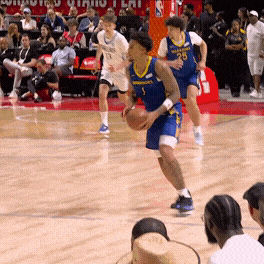 Yaxel Lendeborg soars to the rim for the right-hand tomahawk slam.