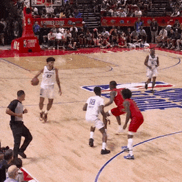 Caleb Wilson knocks down the 3-pointer off the curl, then Cameron Boozer slashes to the rim for the layup.