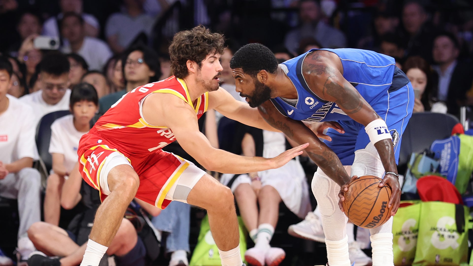 Kyrie returns as Mavs top Rockets in Macao finale