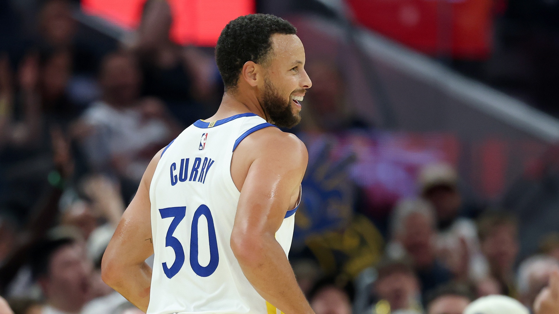 Curry is all smiles after drilling the three through contact