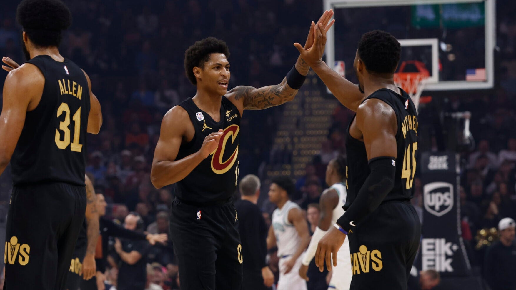 Cavs rally in overtime to hand Wolves first loss