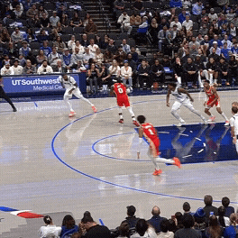 Jalen Johnson finishes the break with a dunk.