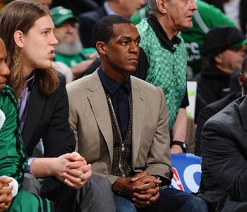 Rajon Rondo sits on bench in street clothes