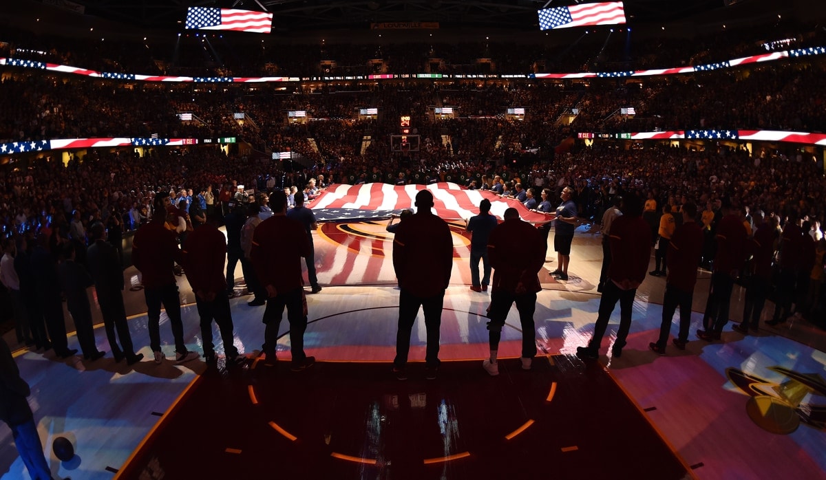 NBA players stand for the National Anthem