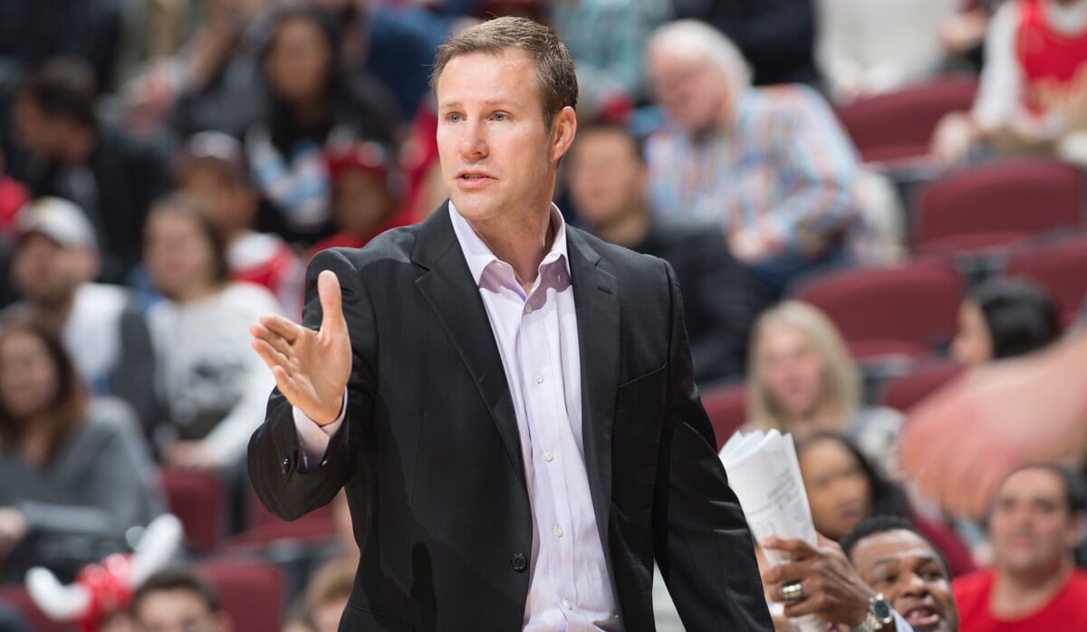 Fred Hoiberg coaching from the sidelines