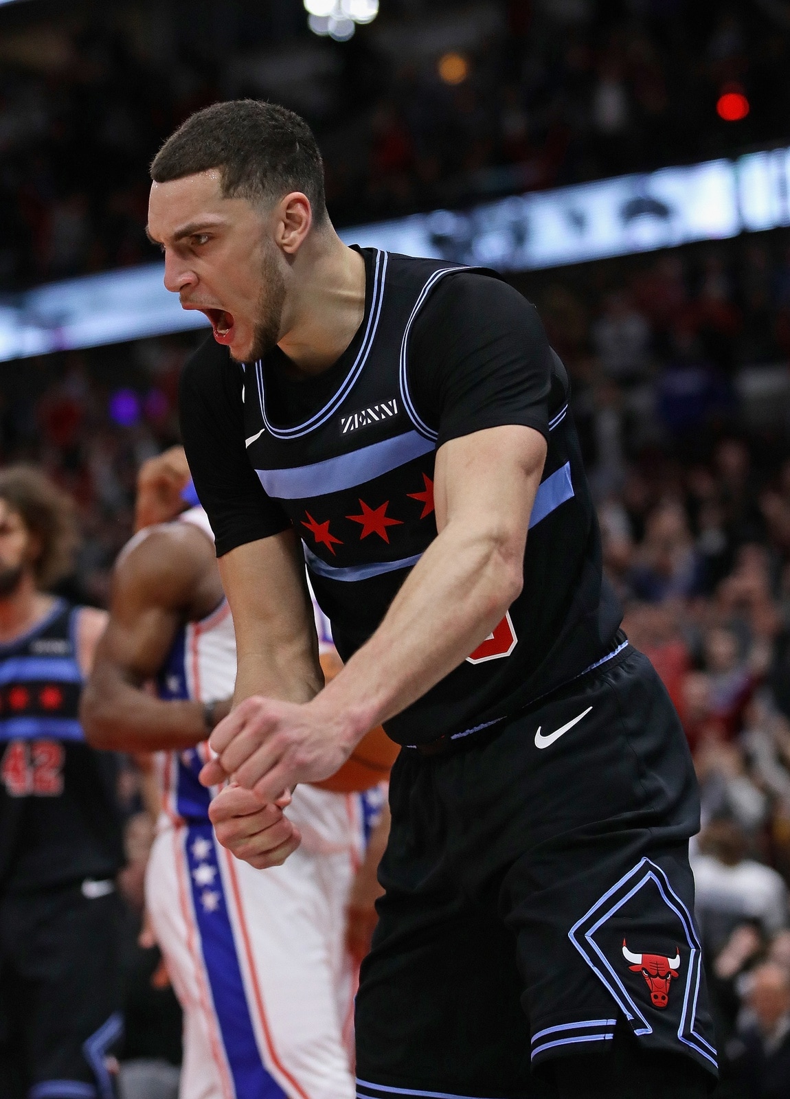 Zach LaVine #8 of the Chicago Bulls celebrates after hitting the game-winning shot against the Philadelphia 76ers at the United Center on March 06, 2019 in Chicago, Illinois. The Bulls defeated the 76ers 108-107.