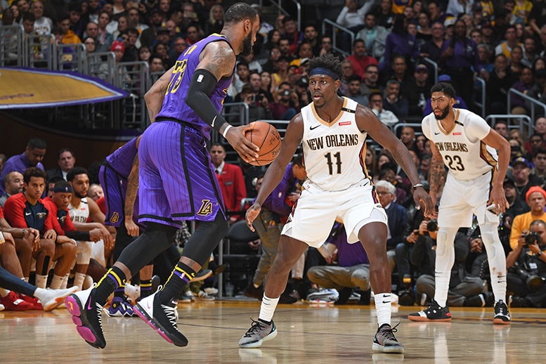 Pelicans Jrue Holiday guards LA Lakers forward LeBron James