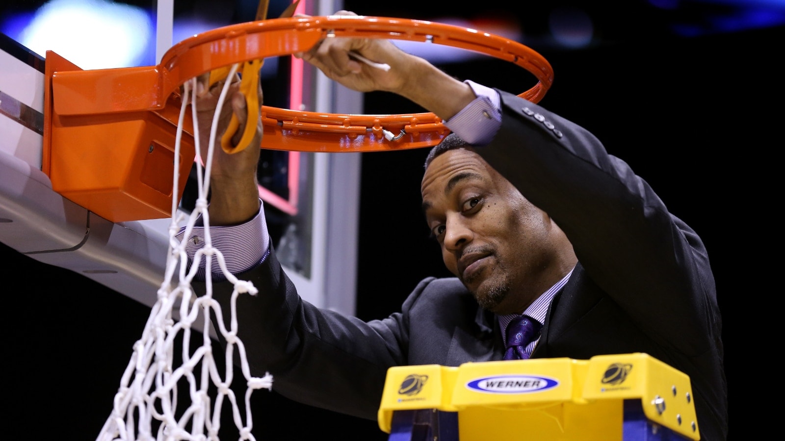 Rod Strickland cuts down the nets for Kentucky