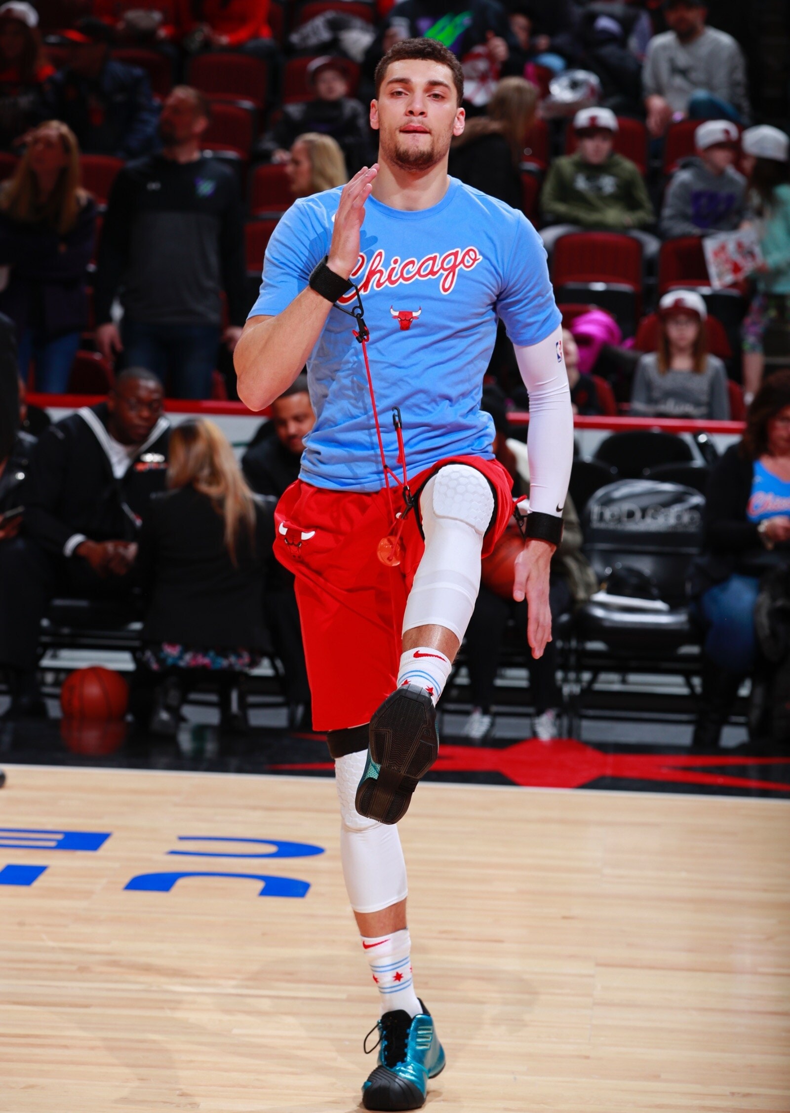 Zach LaVine stretches before the game