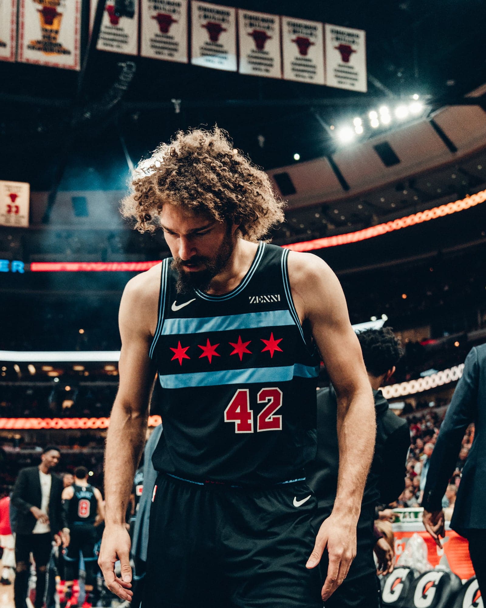 Robin Lopez wearing a black jersey.