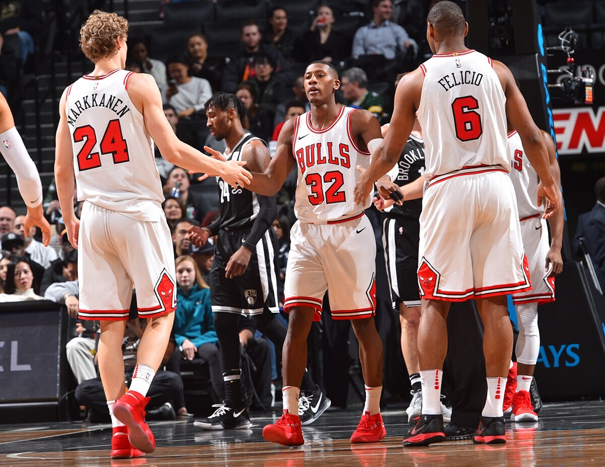 Lauri Markkanen, Kris Dunn & Cristiano Felicio of the Chicago Bulls