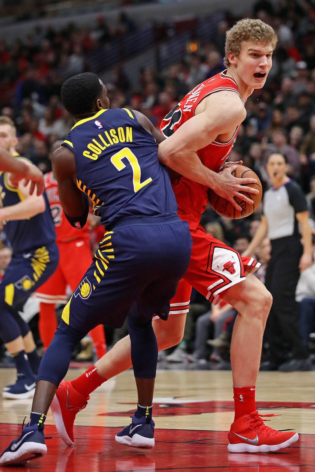 Lauri Markkanen #24 of the Chicago Bulls moves against Darren Collison #2 of the Indiana Pacers